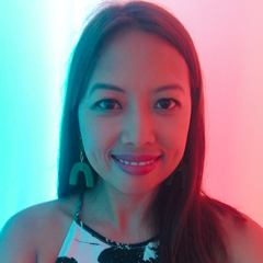 headshot of woman in blue and pink light