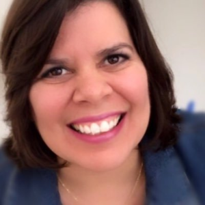 closeup of a smiling woman with brown hair