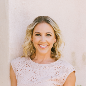 headshot of smiling blond woman